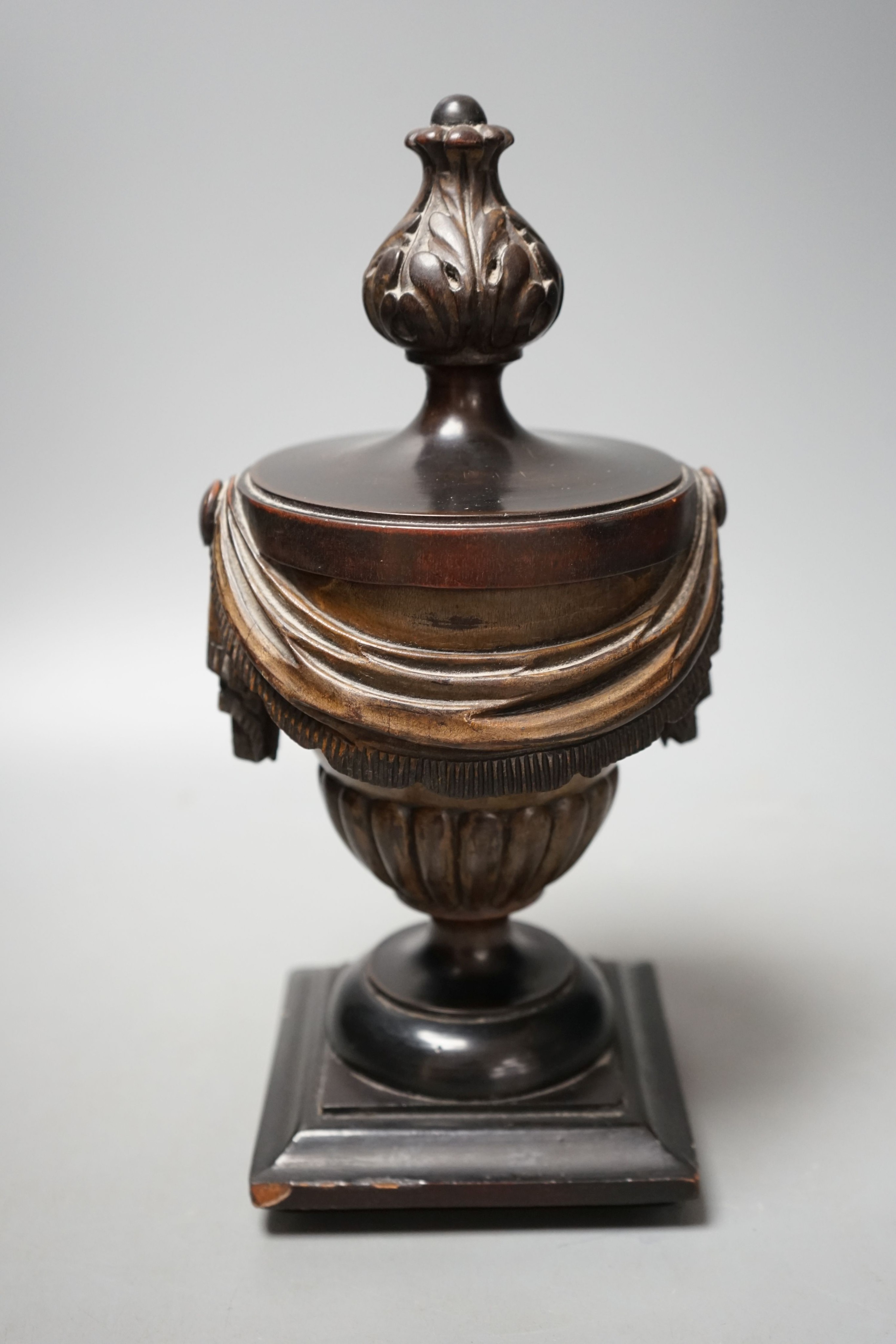 E. H. Pinto collection - a 19th century painted treen neo classical urn, 28cms high.